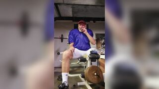 Football  practice uniform and coach relaxing after team leaves