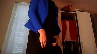 Young amateur cross dresser secretary teasing and masturbating in red hot trench, sexy blue blazer and beautiful black dress - 1 image