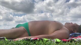 Sunbathing in Bayonne Park in my Green Bikini