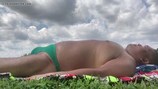 Sunbathing in Bayonne Park in my Green Bikini