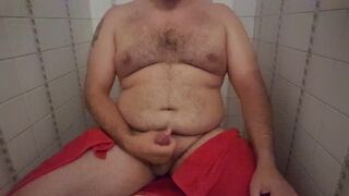 Bear jacking off in the toilets - 1 image