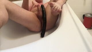 Chubby Gay Boy Takes Big Black Double Dildo Deep in Smooth Ass in Bathtub - 1 image