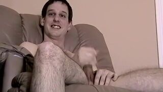 Homo is playing with his shaft and cums while watching porn - 1 image