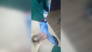 Chinese Doctor Give Patient Treatment with Surgical Uniform Latex Glove 2 - 1 image