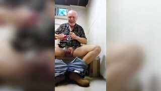 Construction worker relaxing in man cave - 5 image