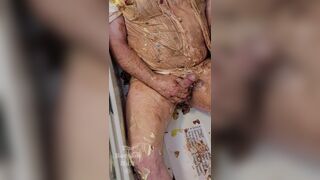 Trying to stain and ruin my white button up shirt by playing a dice game with pies and pudding