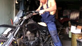 A Russian MECHANIC repairs a MOTORCYCLE in the garage and gets excited and FUCKS a silicone ass - 12 image