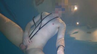 Naked swim and cum with metal cockring and plug