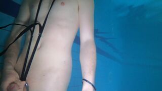 Naked swim and cum with metal cockring and plug