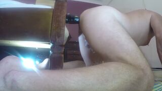 Deep anal play with inflatable butt plug and latex hand