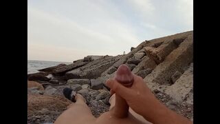 Fingering on a Nudist Beach - 1 image