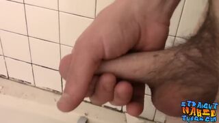 Naughty plumber playing with his cock and making it rain