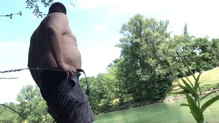 Made to strip, piss, and cum at canal in the middle of the city