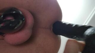 Taking BBC Dildo while locked in Chasity cage