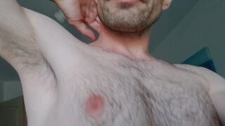 Mature man look with scruffy face and hairy chest