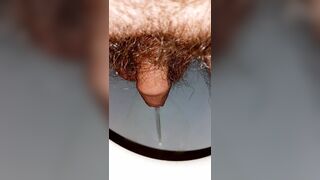 Nice little piss with a little bushy dick