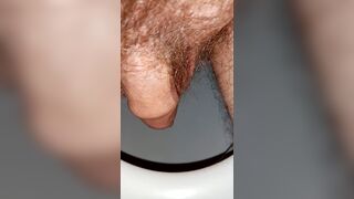 Nice little piss with a little bushy dick