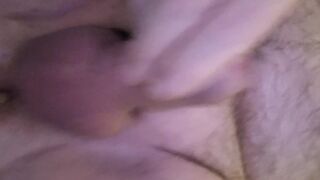 lying in bed and riding a dildo and jerking off my cock