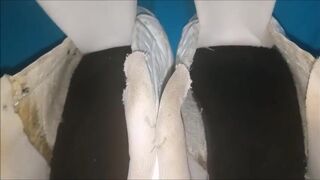 "A pair of white Adidas sneakers worn by a beautiful preppy girl." - 2 image