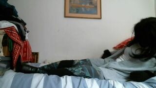 Italian designer boots and grey outfit on the bed - 3 image