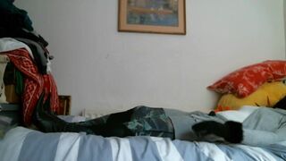 Italian designer boots and grey outfit on the bed - 4 image