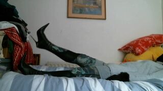 Italian designer boots and grey outfit on the bed - 5 image