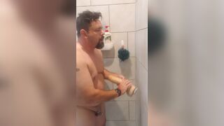 Faggot in chastity fucking 9 and 12 inch dildos in the shower, ending with ass to mouth - 12 image