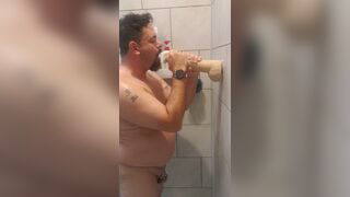 Faggot in chastity fucking 9 and 12 inch dildos in the shower, ending with ass to mouth - 14 image