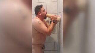 Faggot in chastity fucking 9 and 12 inch dildos in the shower, ending with ass to mouth - 15 image