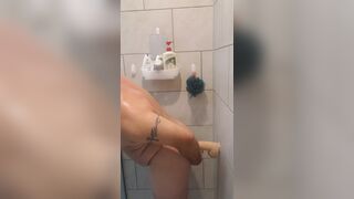 Faggot in chastity fucking 9 and 12 inch dildos in the shower, ending with ass to mouth - 7 image