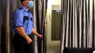 The guard checks the guy and jerks off the store