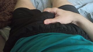A guy in shorts erotically strokes his groin - 15 image