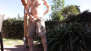 In my backyad with cargo shorts on - 1 image