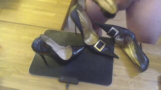 A guy masturbates with a high heel and cums on two pairs high heels - 12 image