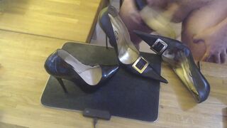 A guy masturbates with a high heel and cums on two pairs high heels - 15 image