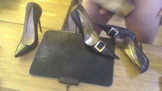 A guy masturbates with a high heel and cums on two pairs high heels - 3 image