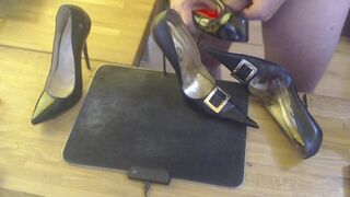 A guy masturbates with a high heel and cums on two pairs high heels