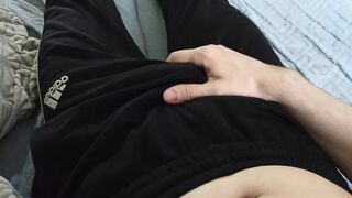 Guy in pants stroking himself and enjoying himself