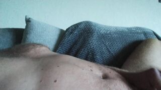 Nice jerk and cumshot in the livingroom