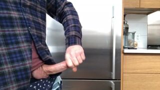 Ejaculation in the kitchen before dinner makes the boy more aroused.