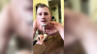 Faggot gags and spits on deep throat fuck machine dildo