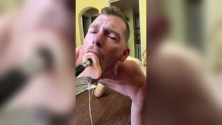 Faggot gags and spits on deep throat fuck machine dildo