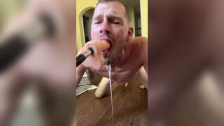 Faggot gags and spits on deep throat fuck machine dildo