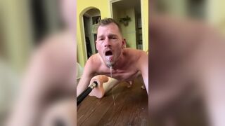 Faggot gags and spits on deep throat fuck machine dildo