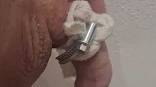 Close up of limp banded cock masturbation until cum or orgasm contractions, tight banding with hose clamp