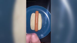Huge watery cumshot on hotdog