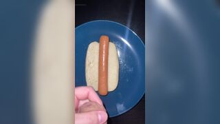 Huge watery cumshot on hotdog