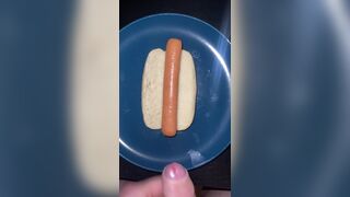 Huge watery cumshot on hotdog
