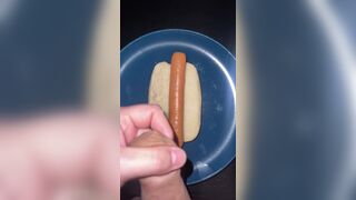 Huge watery cumshot on hotdog