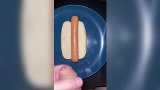 Huge watery cumshot on hotdog